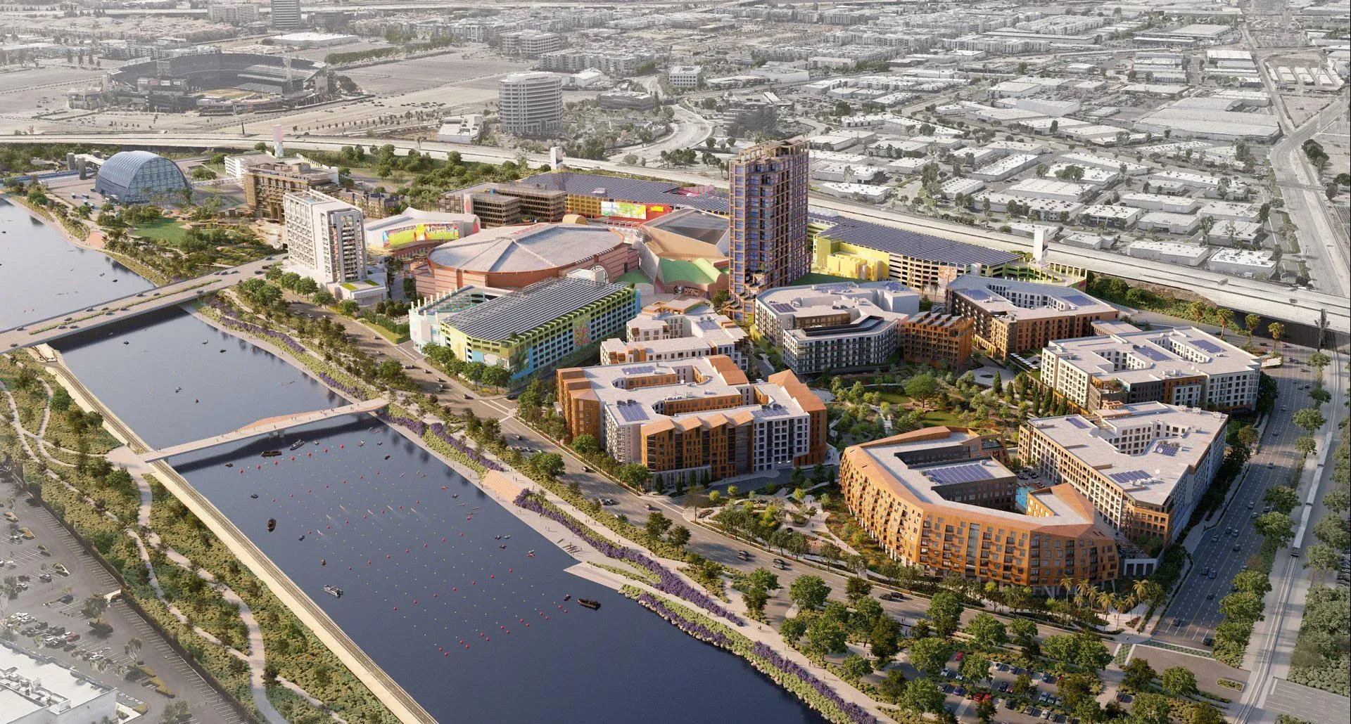 A rendering of the OCVIBE development in Orange County showing Honda Center at the middle and lots of new hotels and parks along new river pathways