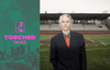 A Torched Talks graphic showing the Torched logo, and Jules Boykoff, dressed in a suit and orange tie in a sports stadium