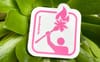 A Torched sticker showing the sports-icon logo of an athlete holding a burning palm tree, on a succulent