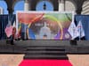 The Games for All backdrop set in a city hall forecourt with Olympic, Paralympic, LA, California and U.S. flags