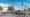 A rendering for the Vermont Corridor Bus Rapid Transit project showing dozens of people crossing a street to a beautiful bus